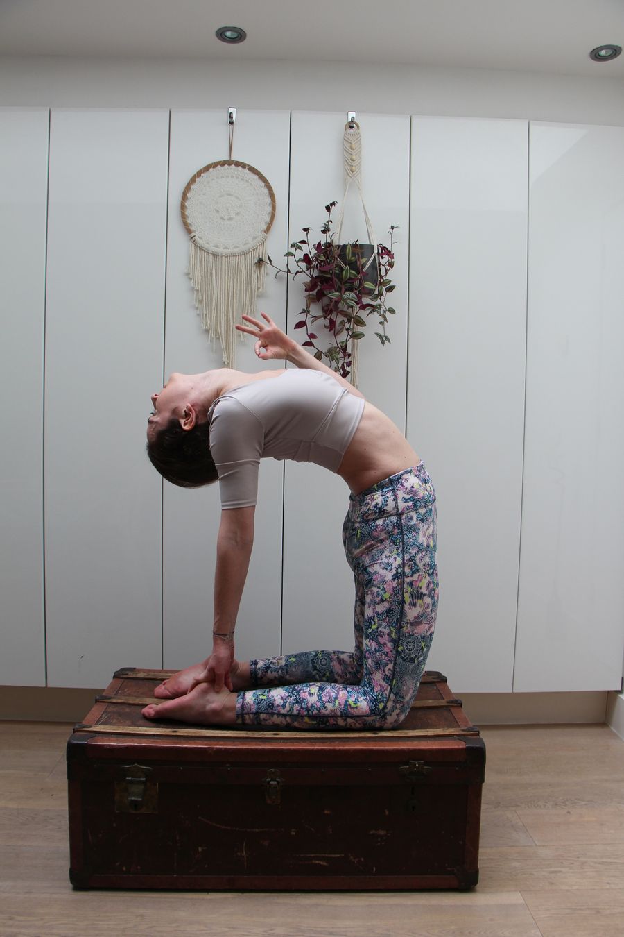 Daria practising camel pose